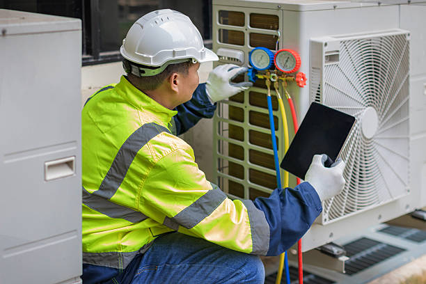 Professional Air Conditioning Repair technician working in Hebron, IL